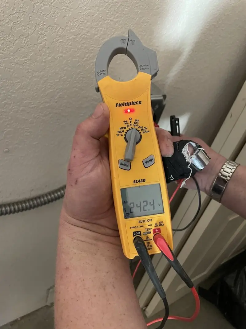 Voltage testing with clamp meter during Ceiling Fan Installation in Upper Saddle River